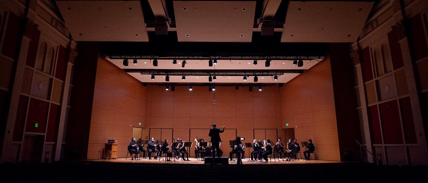 UIW Wind ensemble on stage performing